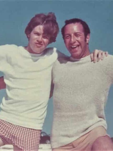 Peter Noone with Harvey Lisberg on the beach in the Bahamas in 1967